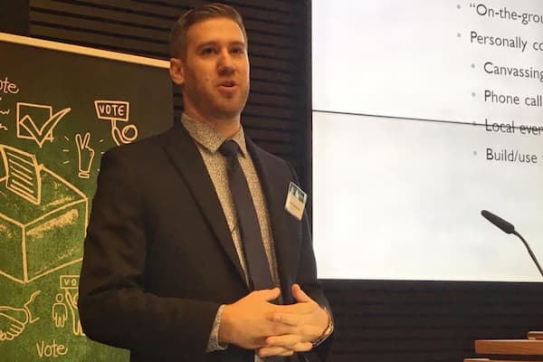 Professor Aaron Weinschenk gives speech