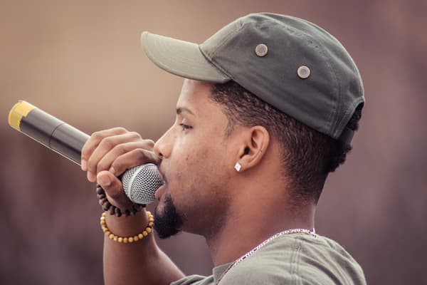 Male student talks into microphone.