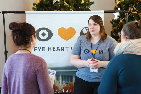 Three students mingling at Common Cahss event