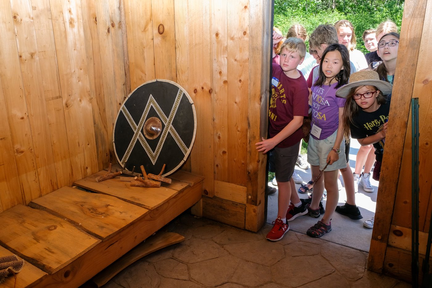 Kids looking into the Viking House