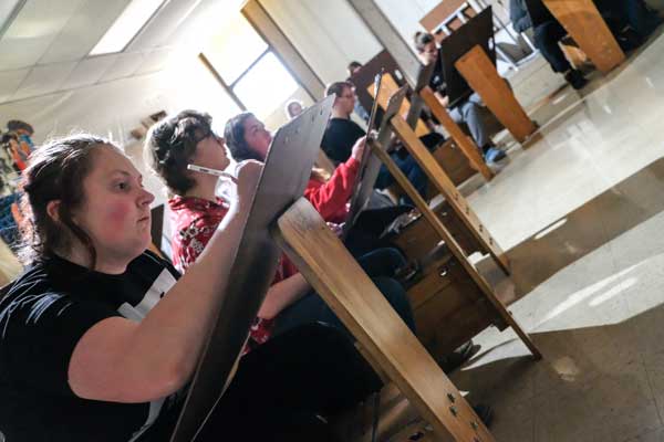 Students use drawing horse in studio