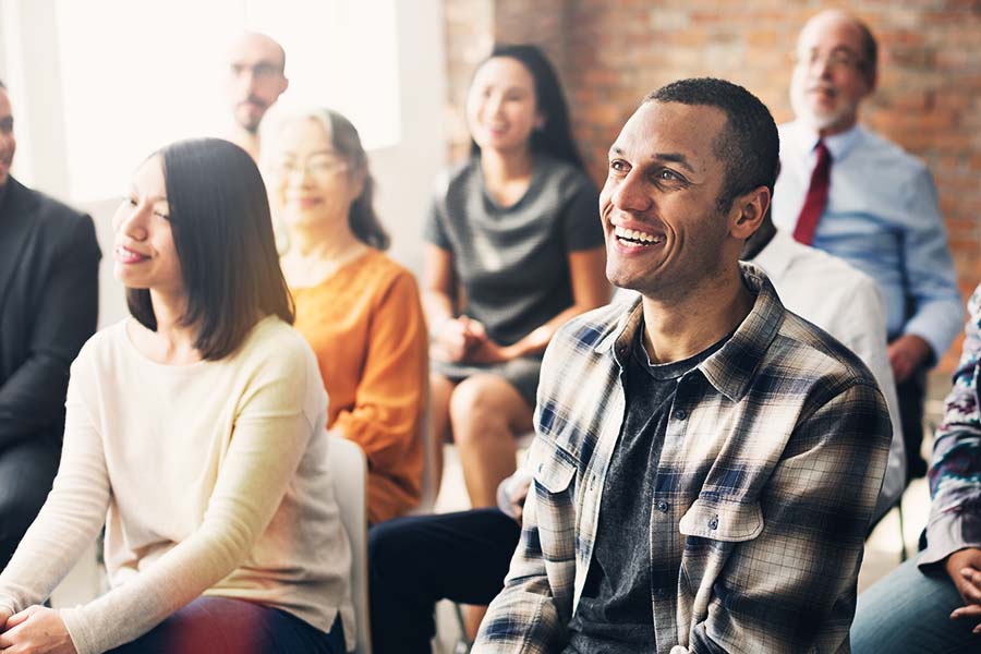 group of people listening during training session