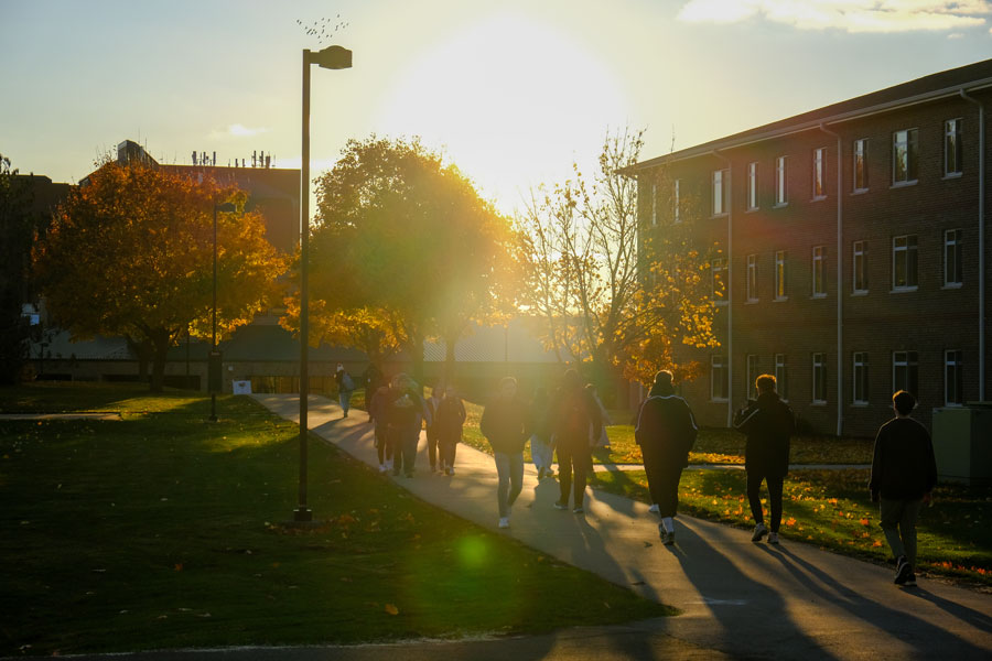 Students walking by dorms