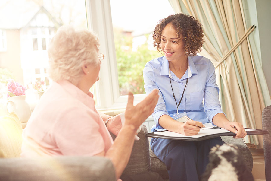 care administrator meeting with senior resident